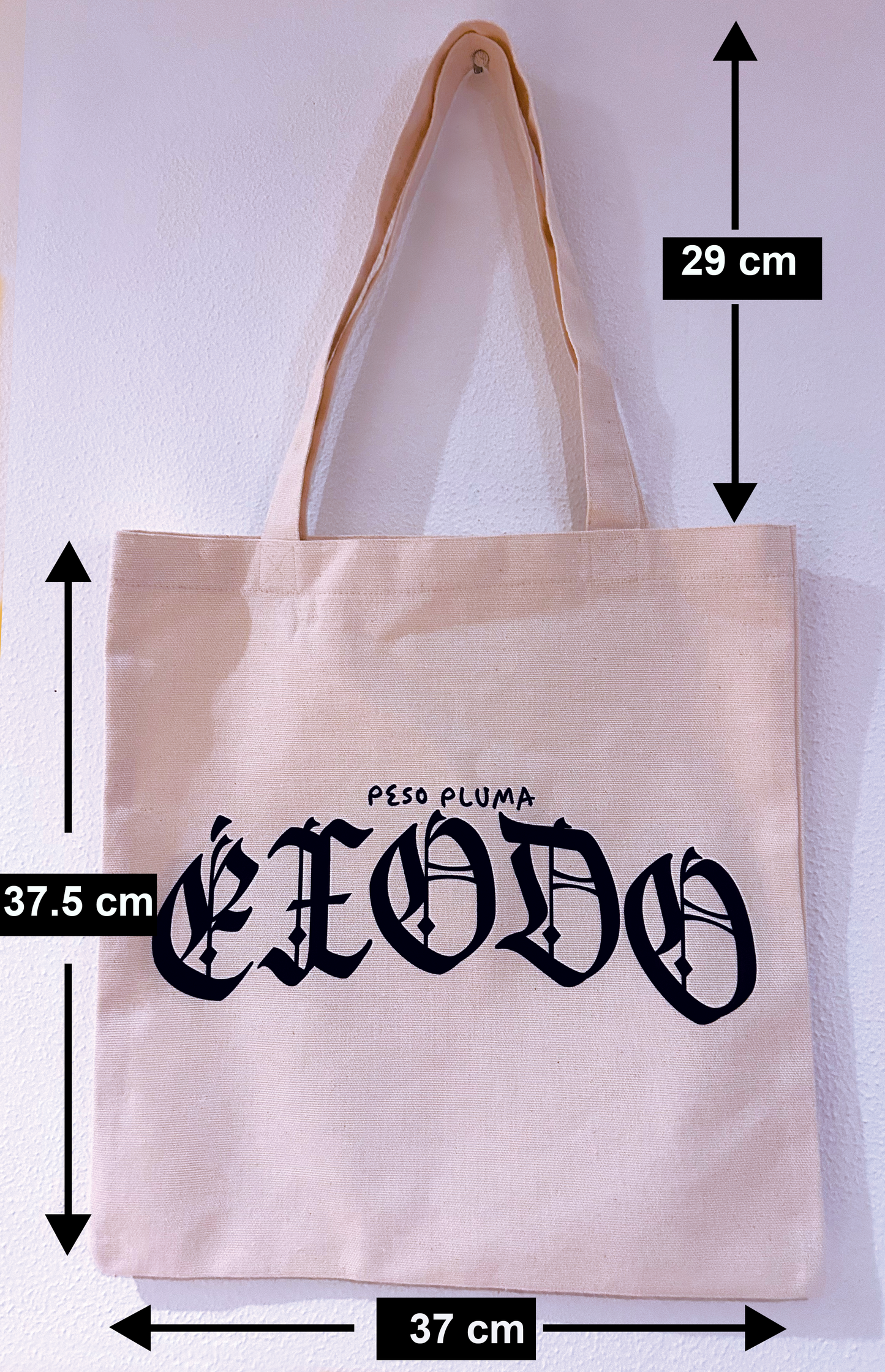 Tote bag Éxodo Peso Pluma color claro.